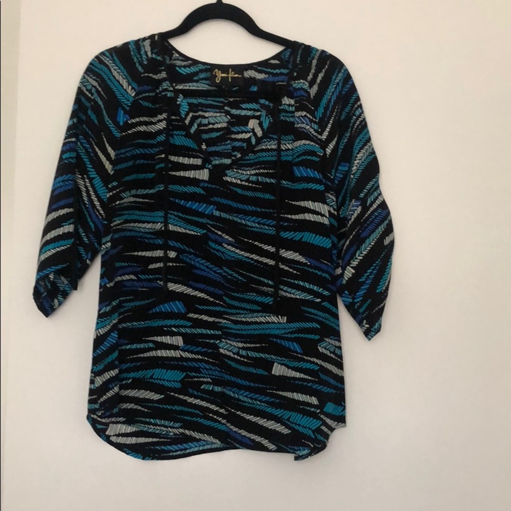 Tumi Kim top